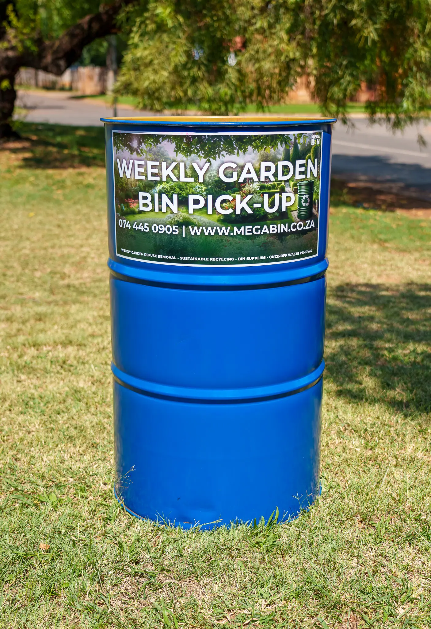 MegaBin truck and drums ready for weekly garden refuse collection